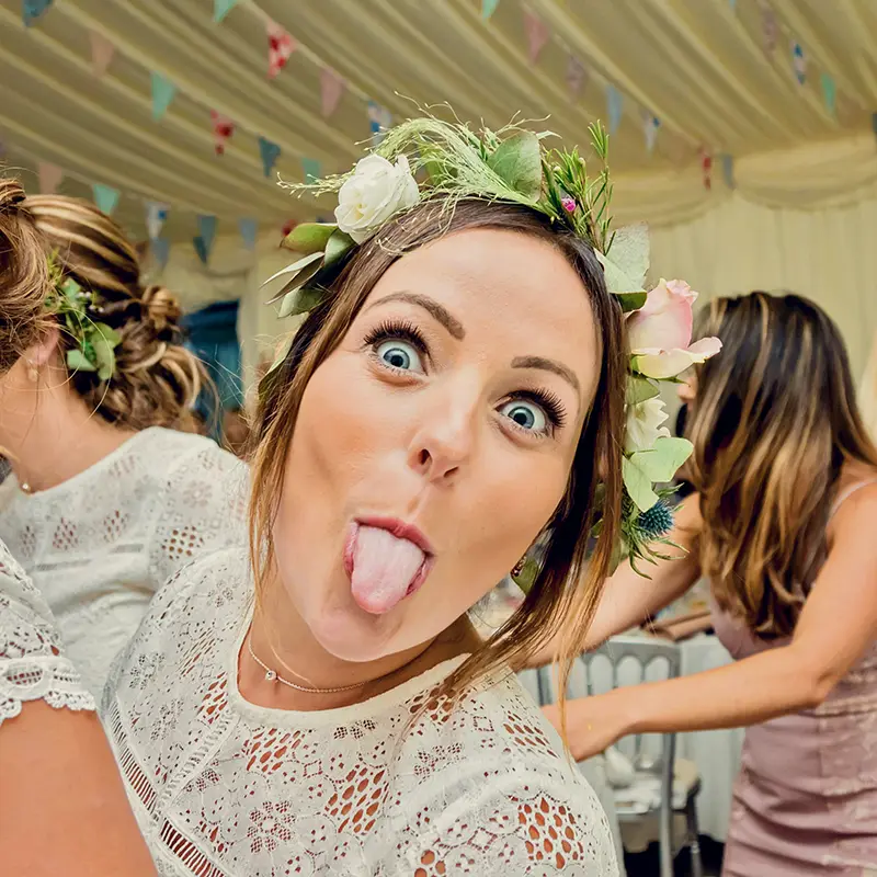 Bride sticking her tongue out at Worcester wedding